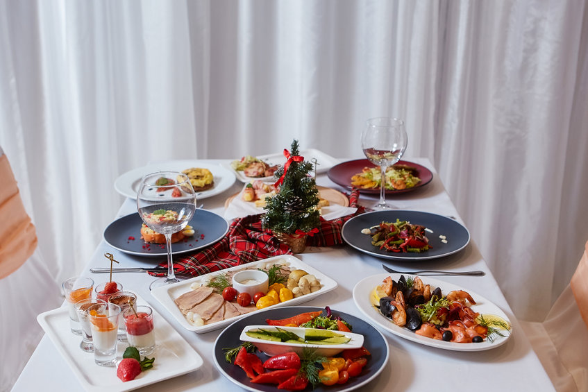 Christmas Dinner. A table in the restaurant, served for two people, is ready for the New Year.